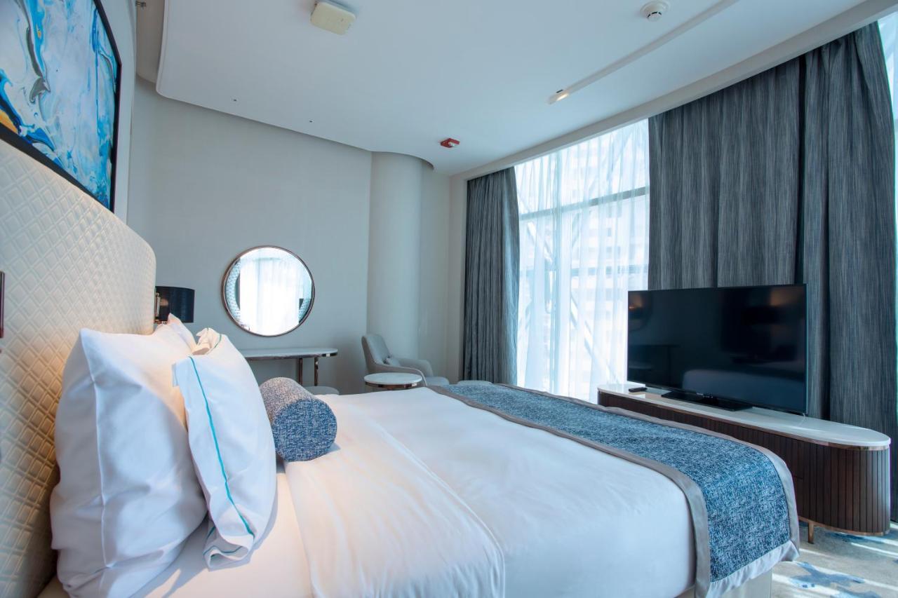 Century Marina Hotel - Lusail Luaran gambar A bedroom at the hotel
