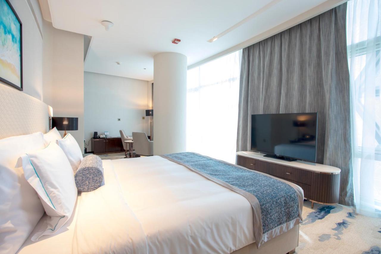 Century Marina Hotel - Lusail Luaran gambar A bedroom at the hotel