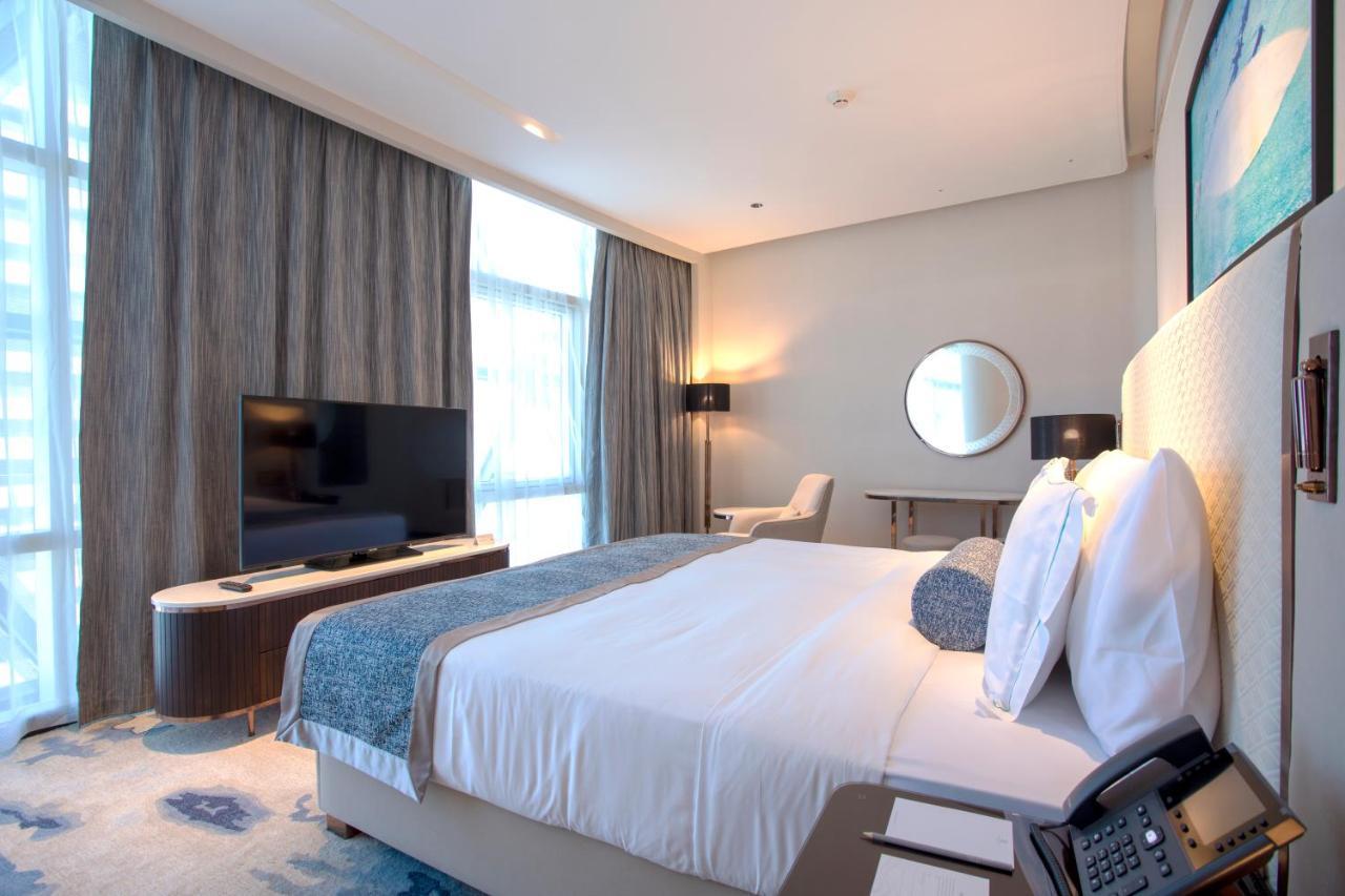 Century Marina Hotel - Lusail Luaran gambar A bedroom at the hotel