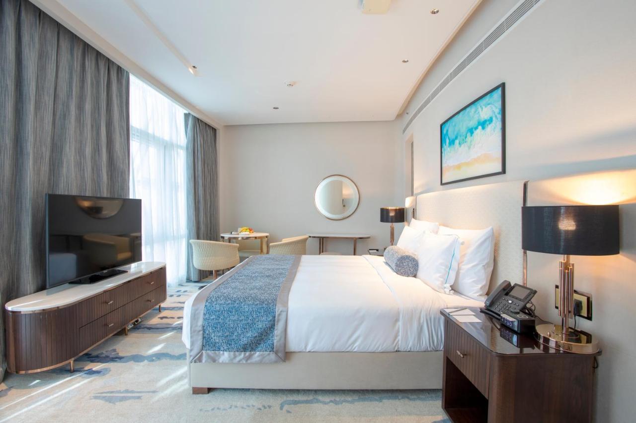 Century Marina Hotel - Lusail Luaran gambar A bedroom at the hotel