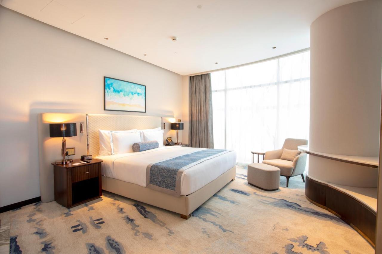 Century Marina Hotel - Lusail Luaran gambar A bedroom at the hotel